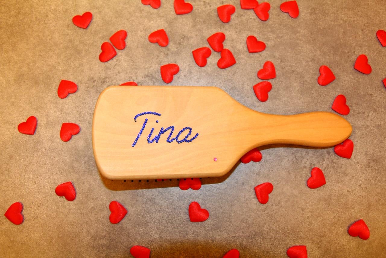 Customized wooden hairbrush